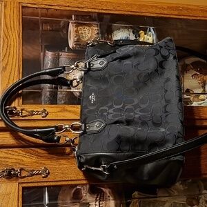 Coach Handbag - I carried a couple times. It's a tad bigger than what I carry.